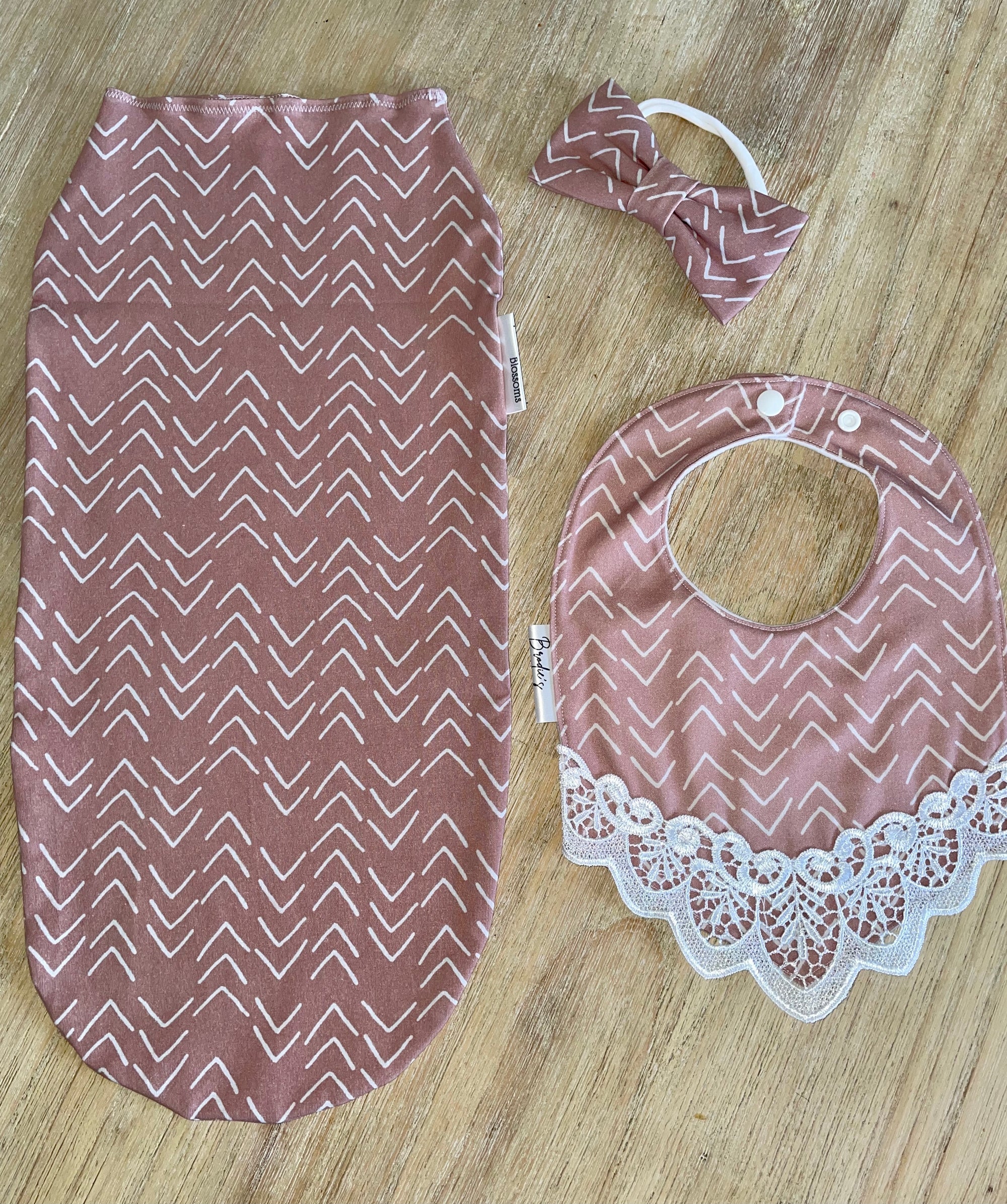 dusty rose swaddle bib