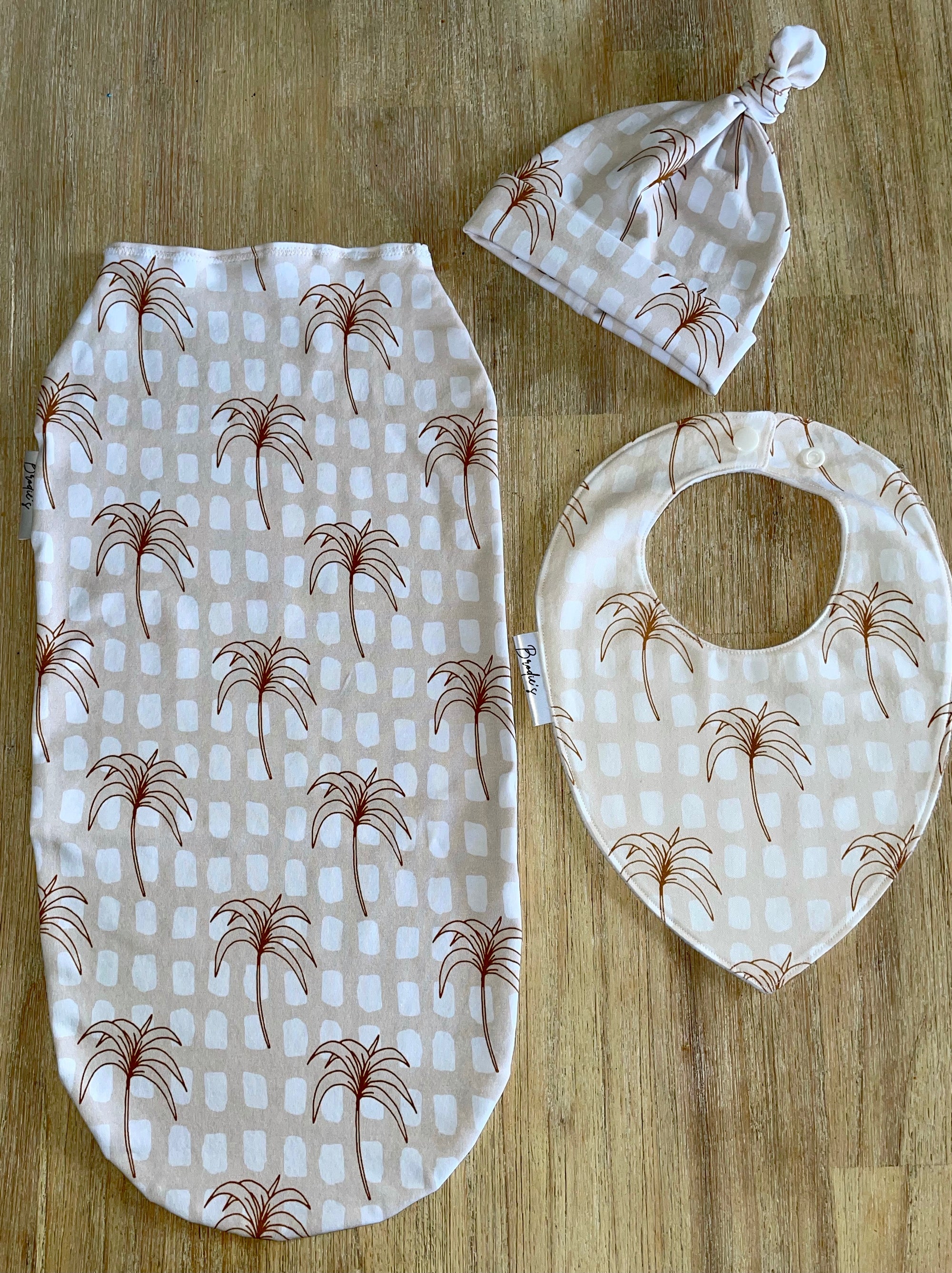 sandy palms handmade swaddle bib